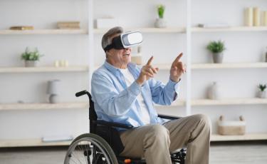 Senior with VR headset