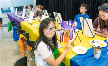 image: Youth painting mike at PYF