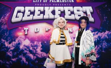 Two people dressed in cosplay for GeekFest