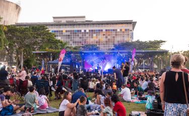 image: crowd of people sitting and stage