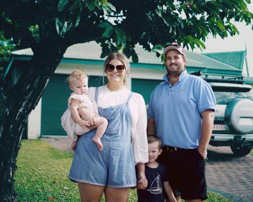 Family in front of their house